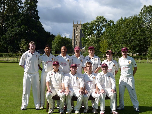 OBS cricket XI lined up on the ground